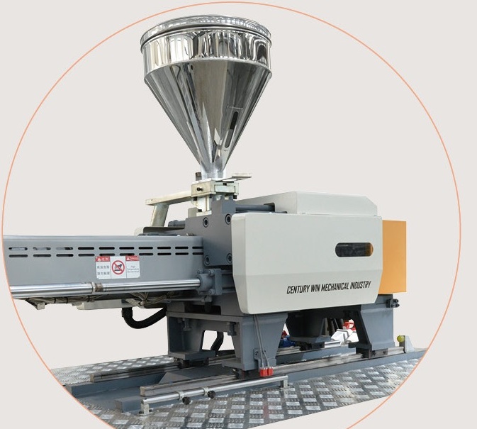 GB Series injection unit and material hopper shown in the original catalogue